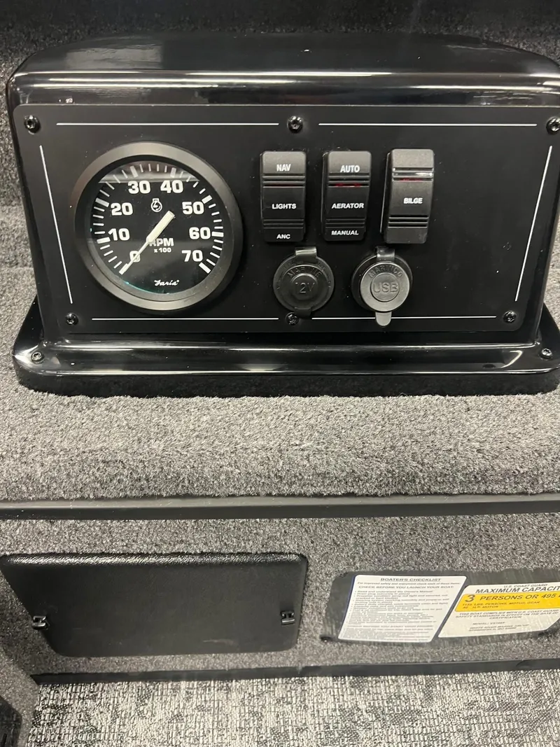 Slide: The Image of 2025 Ranger VS1665T dashboard with RPM gauge and control switches. - 6