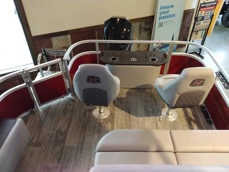 Slide: The Image of 2025 Ranger Reata 223F boat interior with seating and control panel. - 6