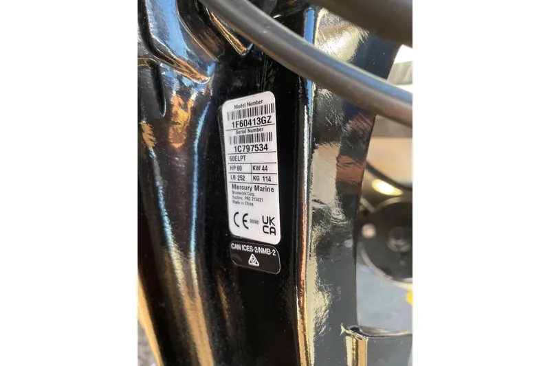 Slide: The Image of Label on 2025 Mako Pro Skiff 15 CC, displaying model and serial numbers. - 63