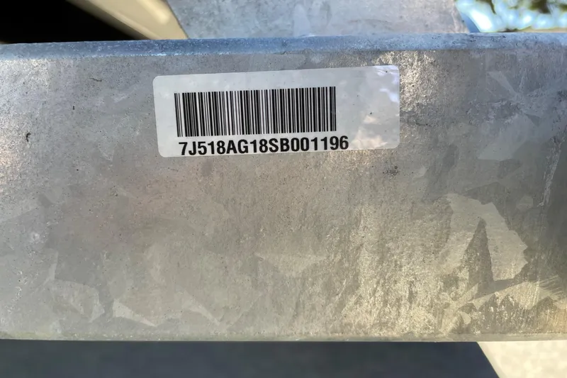 Slide: The Image of Barcode on metal surface of 2025 Mako Pro Skiff 15 CC boat. - 64