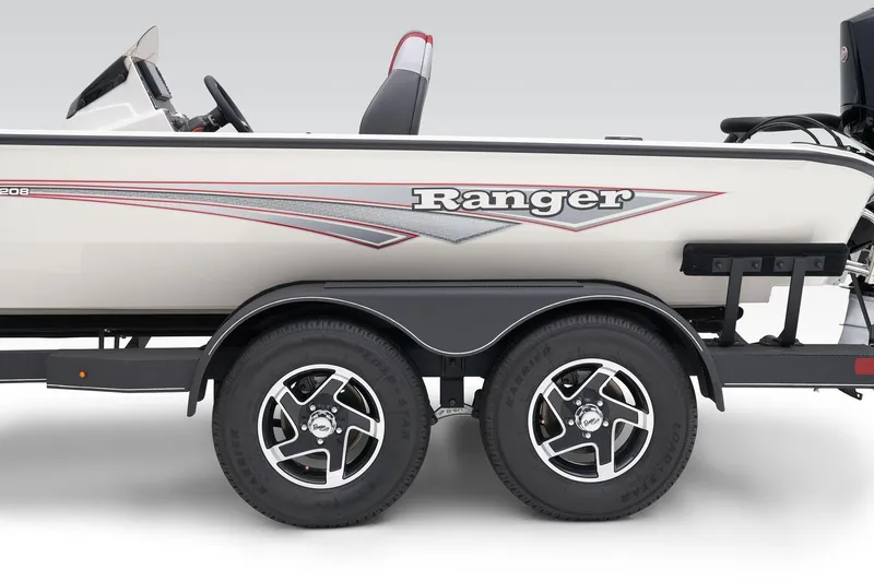 Slide: The Image of 2025 Ranger ALPHA 208 boat on trailer, showcasing sleek design and dual wheels. - 7