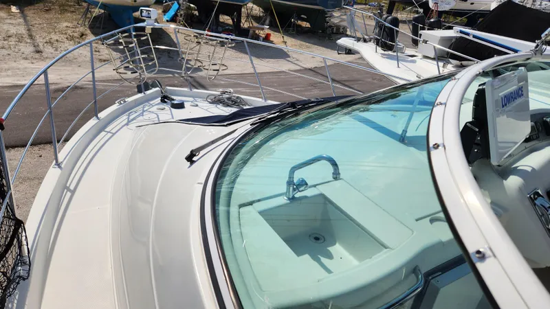 Slide: The Image of 2008 Carver 36 Mariner yacht deck with railing and windshield. - 15