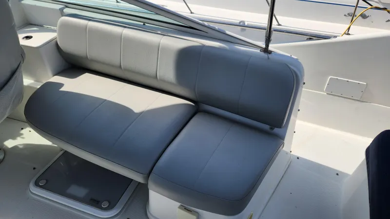 Slide: The Image of 2008 Carver 36 Mariner boat seating area with gray upholstery. - 16