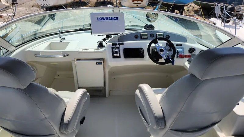 Slide: The Image of 2008 Carver 36 Mariner helm with Lowrance navigation system and dual captain chairs. - 18