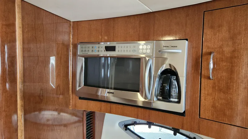 Slide: The Image of 2008 Carver 36 Mariner kitchen with built-in microwave and coffee maker. - 41