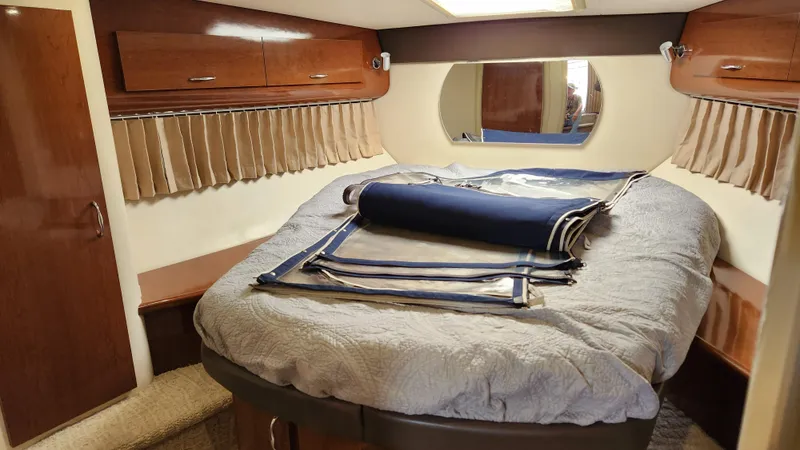 Slide: The Image of Interior cabin of 2008 Carver 36 Mariner yacht with bed and storage. - 43