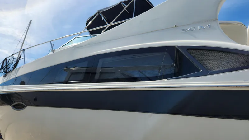 Slide: The Image of 2008 Carver 36 Mariner yacht with sleek design and modern features. - 7
