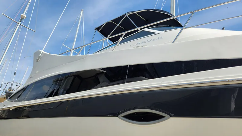 Slide: The Image of 2008 Carver 36 Mariner yacht with sleek design and modern features. - 8