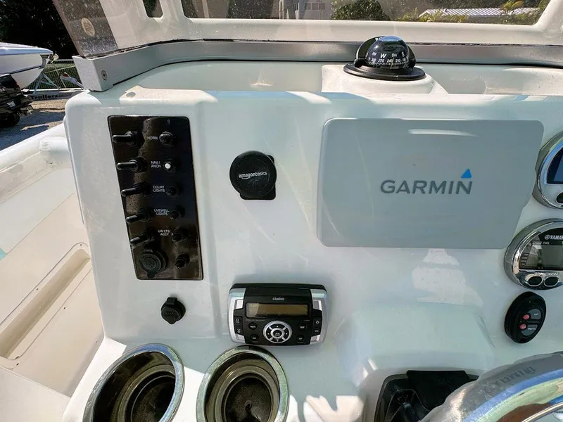 Slide: The Image of 2018 Robalo R222 Center Console dashboard with Garmin navigation system. - 11