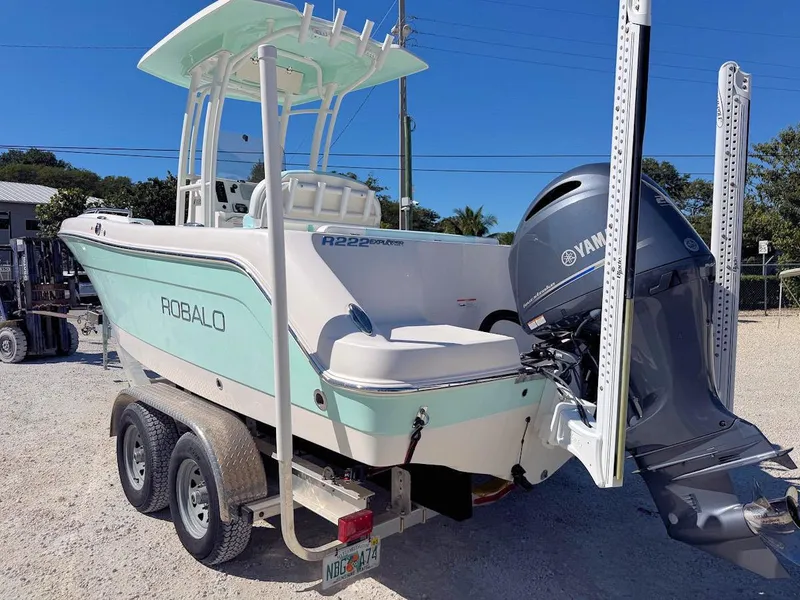Slide: The Image of 2018 Robalo R222 Center Console boat on trailer with Yamaha outboard motor. - 3
