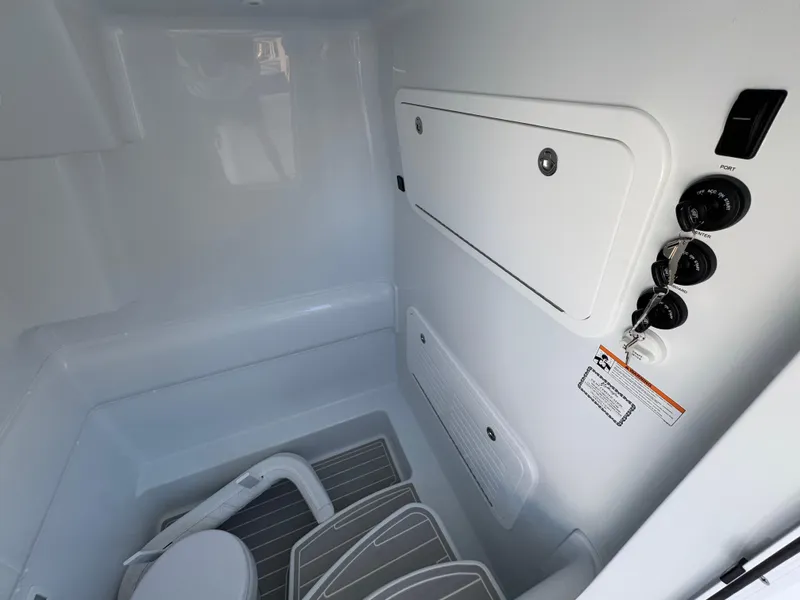 Slide: The Image of 2025 Yellowfin 39 Offshore boat interior with storage compartments and seating. - 45