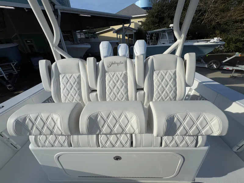 Slide: The Image of 2025 Yellowfin 39 Offshore boat with luxurious white diamond-stitched seating. - 48