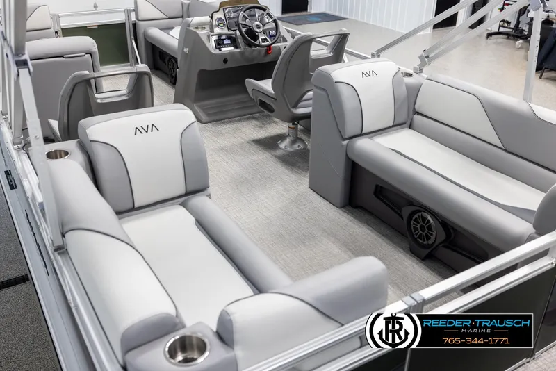 Slide: The Image of 2025 Avalon VEN QL boat interior with plush seating and modern dashboard. - 11