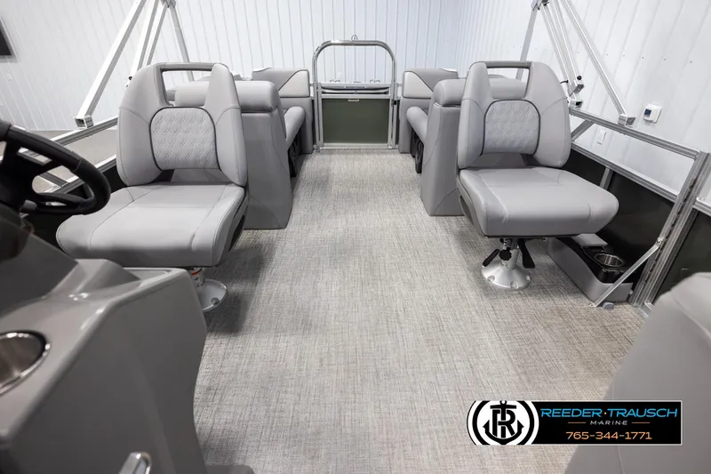 Slide: The Image of Interior of 2025 Avalon VEN QL pontoon boat with gray seating and carpet flooring. - 14