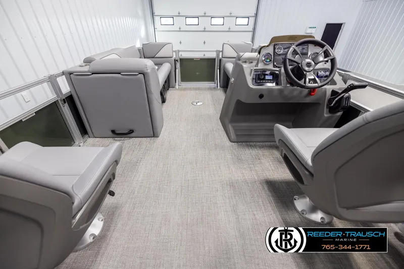 Slide: The Image of Interior of 2025 Avalon VEN QL boat with modern seating and steering console. - 17