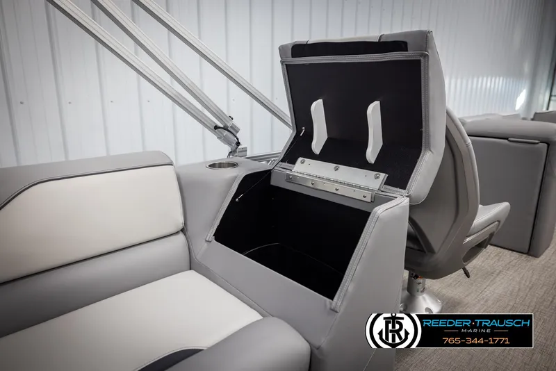 Slide: The Image of 2025 Avalon VEN QL boat interior with open storage compartment and seating. - 24