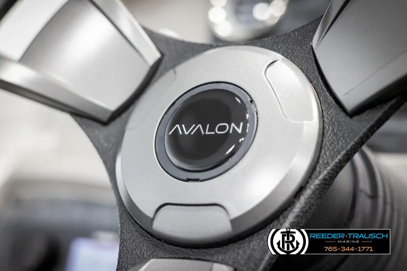 Slide: The Image of Steering wheel of 2025 Avalon VEN QL with logo, close-up view. - 27