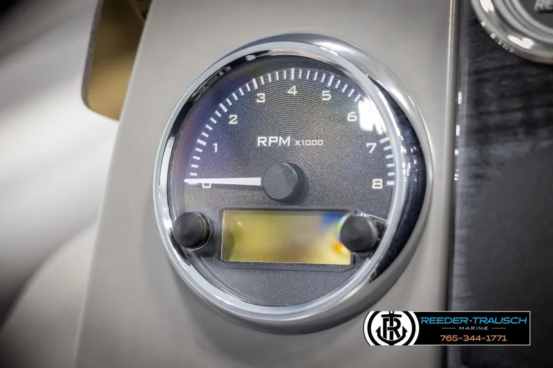 Slide: The Image of Tachometer of 2025 Avalon VEN QL, displaying RPM x1000, with dealership logo. - 29