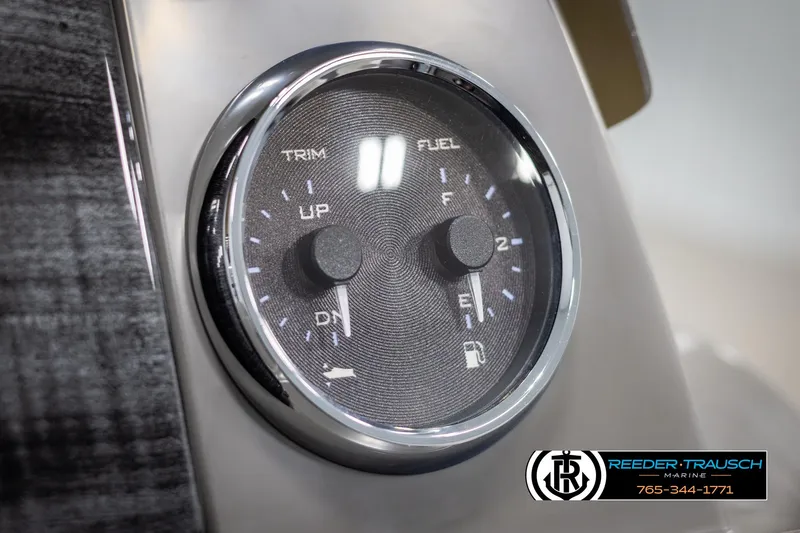 Slide: The Image of 2025 Avalon VEN QL dashboard gauge showing trim and fuel levels. - 31