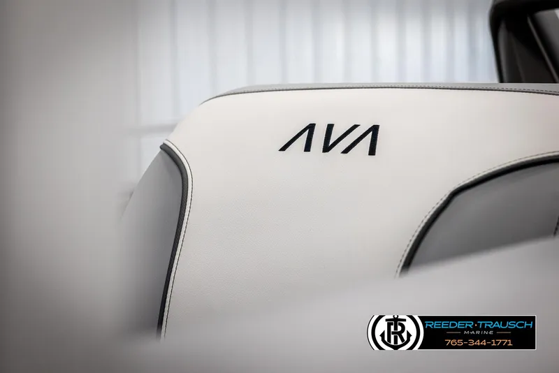 Slide: The Image of 2025 Avalon VEN QL seat with AVA logo, Reeder-Trausch Marine branding. - 38