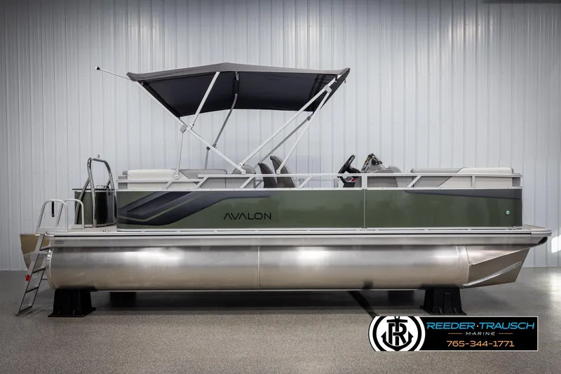 Slide: The Image of 2025 Avalon VEN QL pontoon boat with canopy in showroom. - 5