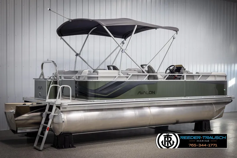 Slide: The Image of 2025 Avalon VEN QL pontoon boat with canopy in showroom. - 6