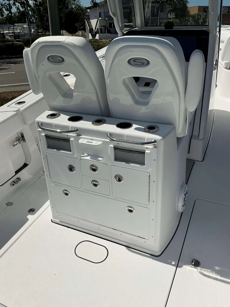 Slide: The Image of 2025 Sportsman 262 Open boat interior with dual seats and storage compartments. - 6