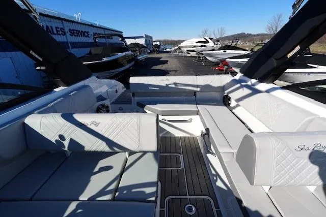 Slide: The Image of 2025 Sea Ray SDX 250 boat interior with luxurious seating and sleek design. - 15