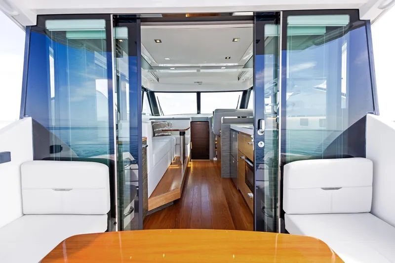 Slide: The Image of Interior view of 2019 Tiara Yachts 39 Coupe, featuring sleek design and modern furnishings. - 24