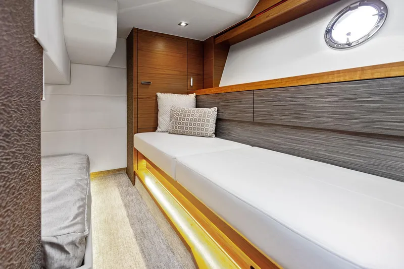 Slide: The Image of 2019 Tiara Yachts 39 Coupe interior cabin with modern design and comfortable seating. - 42