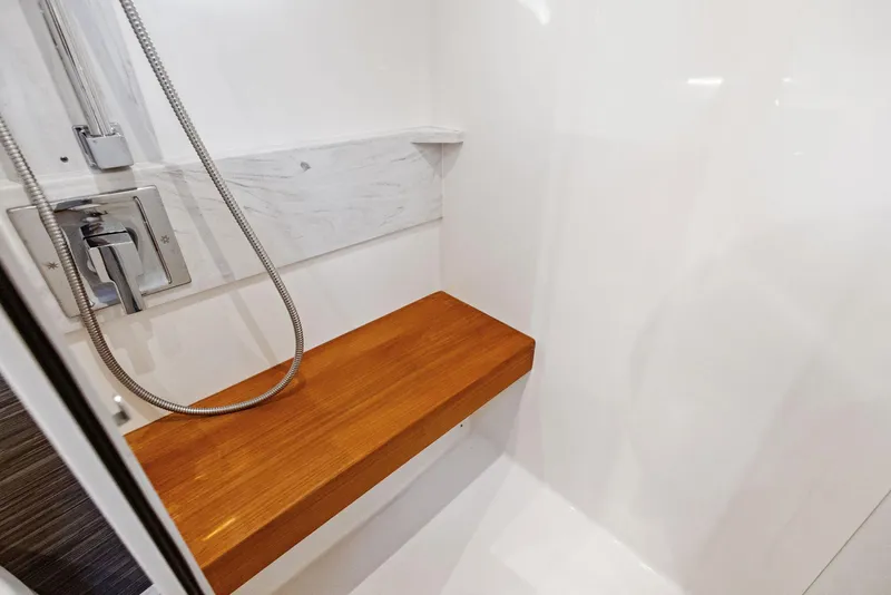 Slide: The Image of Shower area with wooden bench in 2019 Tiara Yachts 39 Coupe. - 45
