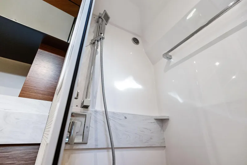 Slide: The Image of Shower area in 2019 Tiara Yachts 39 Coupe, featuring sleek modern design. - 46