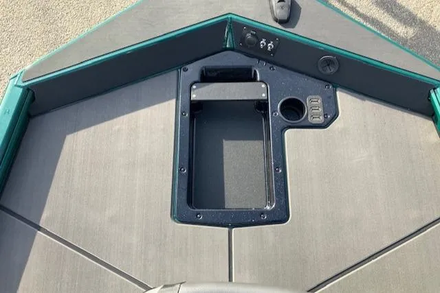 Slide: The Image of 2025 Lund 1875 Renegade SS boat deck with storage compartment and control panel. - 10