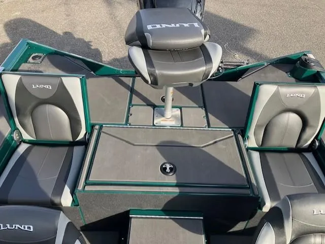 Slide: The Image of 2025 Lund 1875 Renegade SS boat interior with seating and storage compartments. - 7