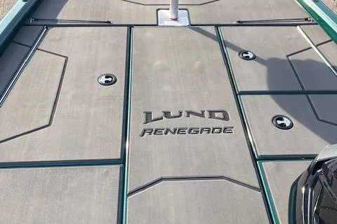 Slide: The Image of 2025 Lund 1875 Renegade SS boat deck with logo and storage compartments. - 8