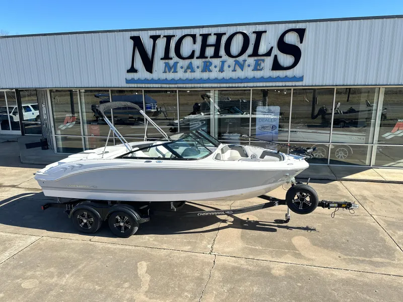 Slide: The Image of 2025 Chaparral 21 SSi Ski & Fish boat on trailer at Nichols Marine dealership. - 1