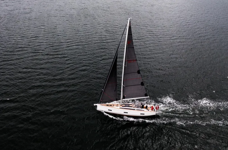 The Image of 2026 X-Yachts X4 9 sailing on open water, aerial view. - 1