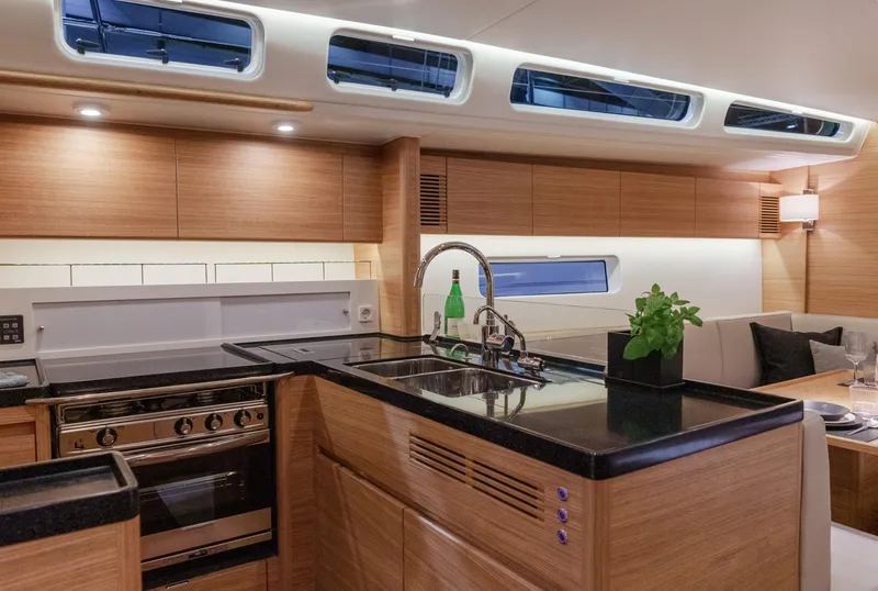 Slide: The Image of Luxurious interior of 2026 X-Yachts X4 9, featuring modern kitchen and elegant design. - 8
