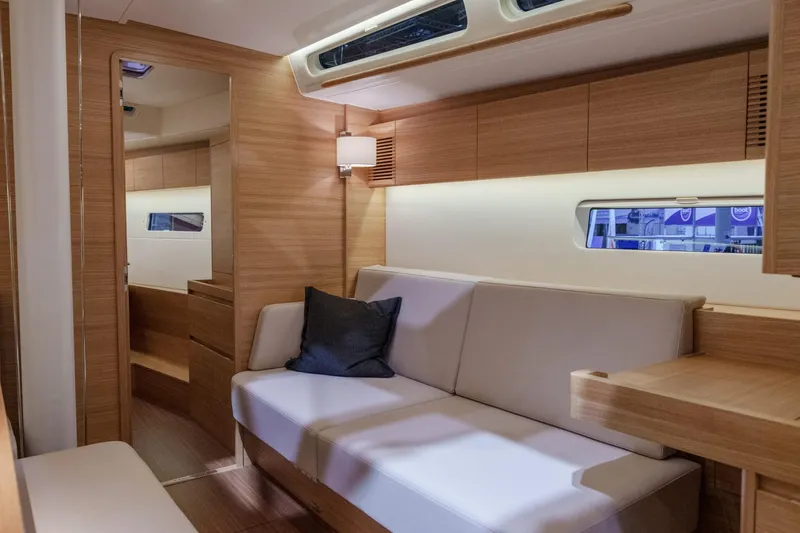 Slide: The Image of 2026 X-Yachts X4 9 interior with modern wood finish and comfortable seating. - 9