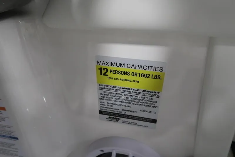 Slide: The Image of 2025 Chaparral 21 SSi capacity label: 12 persons or 1692 lbs maximum. - 22