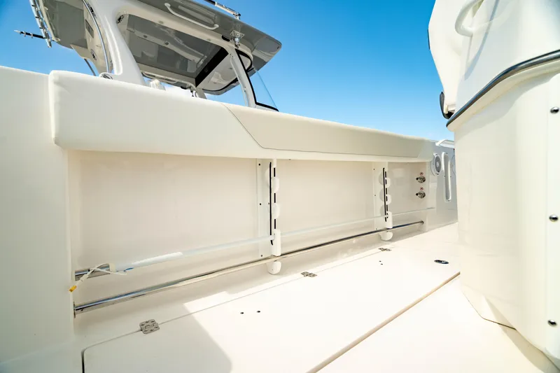 Slide: The Image of 2025 Edgewater 262CC boat interior with sleek white design and modern features. - 22
