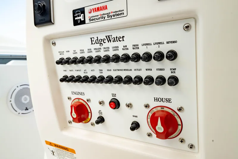 Slide: The Image of Control panel of 2025 Edgewater 262CC boat with Yamaha security system. - 35