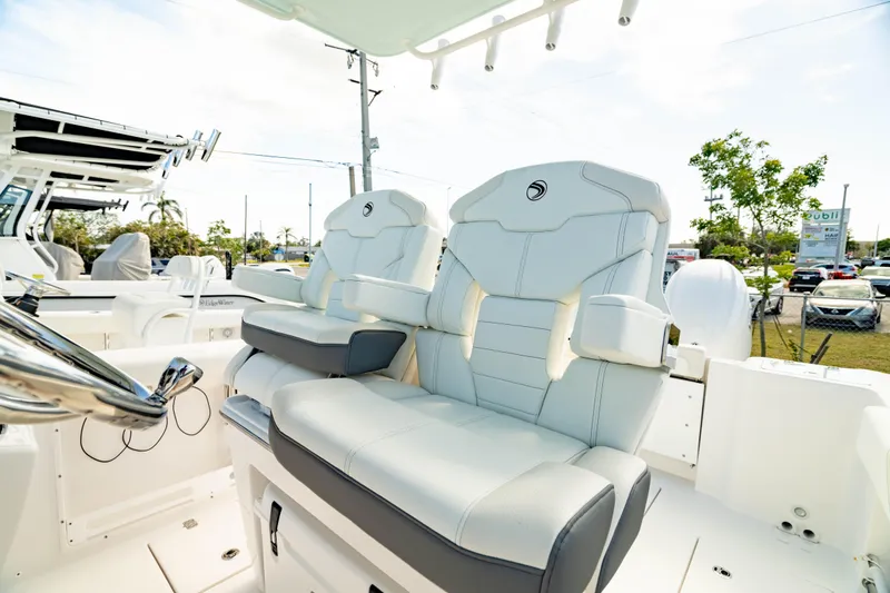 Slide: The Image of 2025 Edgewater 262CC boat with luxurious seating and modern design. - 41