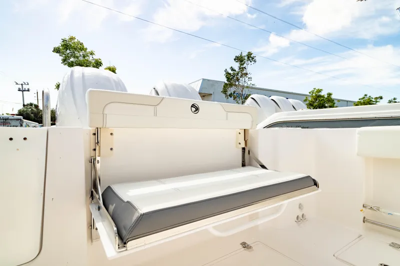 Slide: The Image of 2025 Edgewater 262CC boat with foldable seating, showcasing modern design and functionality. - 5