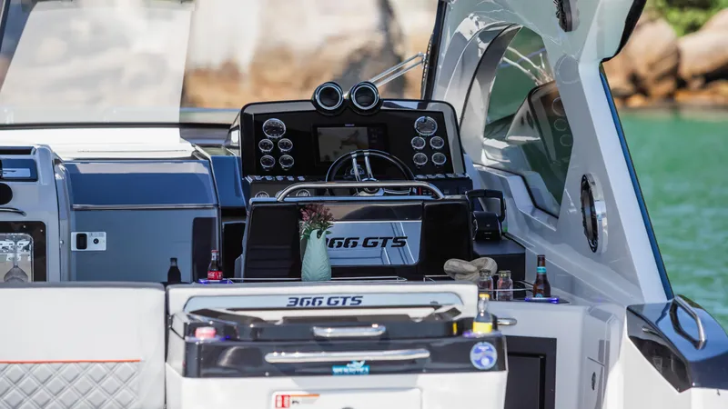 Slide: The Image of Granfort 366 GTS 2025 boat interior with modern dashboard and steering wheel. - 10