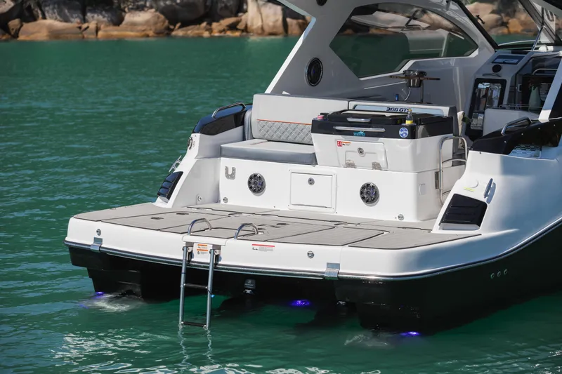 Slide: The Image of Granfort 366 GTS 2025 luxury boat with spacious deck and modern design on turquoise water. - 12