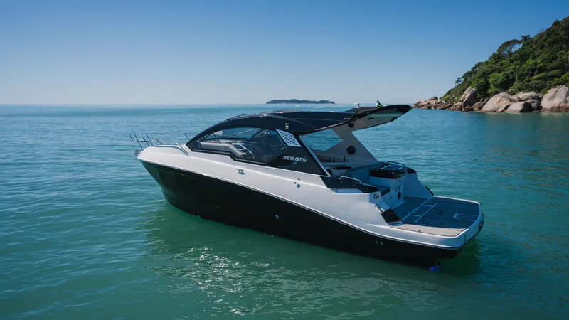 Slide: The Image of Granfort 366 GTS 2025 luxury yacht on serene blue water, clear sky background. - 4