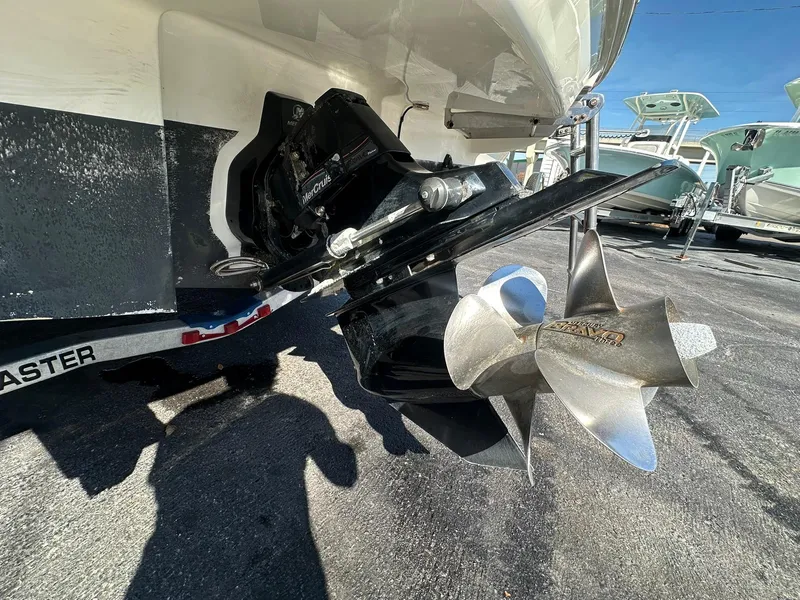 Slide: The Image of 2010 Sea Ray 240 Sundancer boat propeller and stern drive detail. - 7