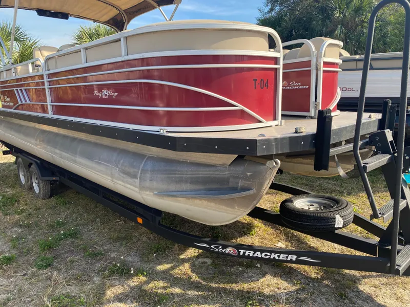 Slide: The Image of 2020 Sun Tracker Party Barge 24 DLX pontoon boat on trailer. - 3