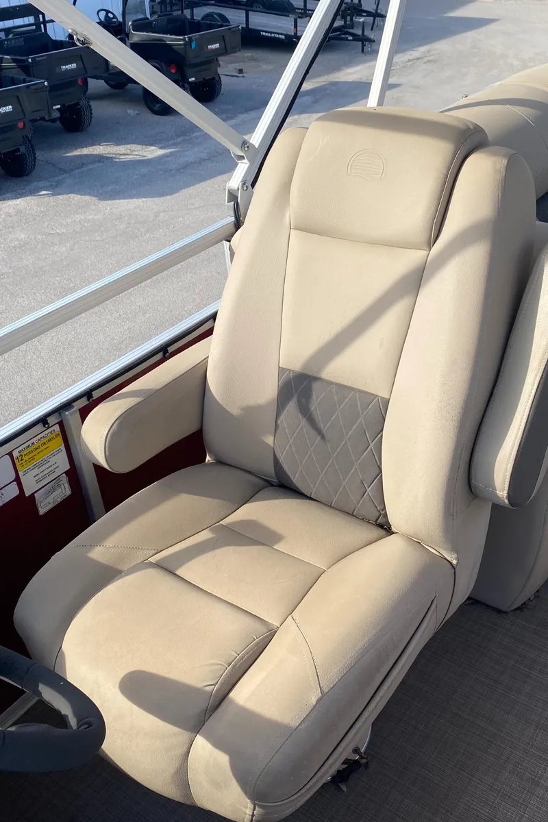 Slide: The Image of 2020 Sun Tracker Party Barge 24 DLX captain's chair, beige upholstery, diamond-patterned insert. - 6